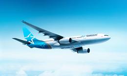 Bild zeigt Flugzeug der kanadischen Fluglinie Air Transat in der Luft.